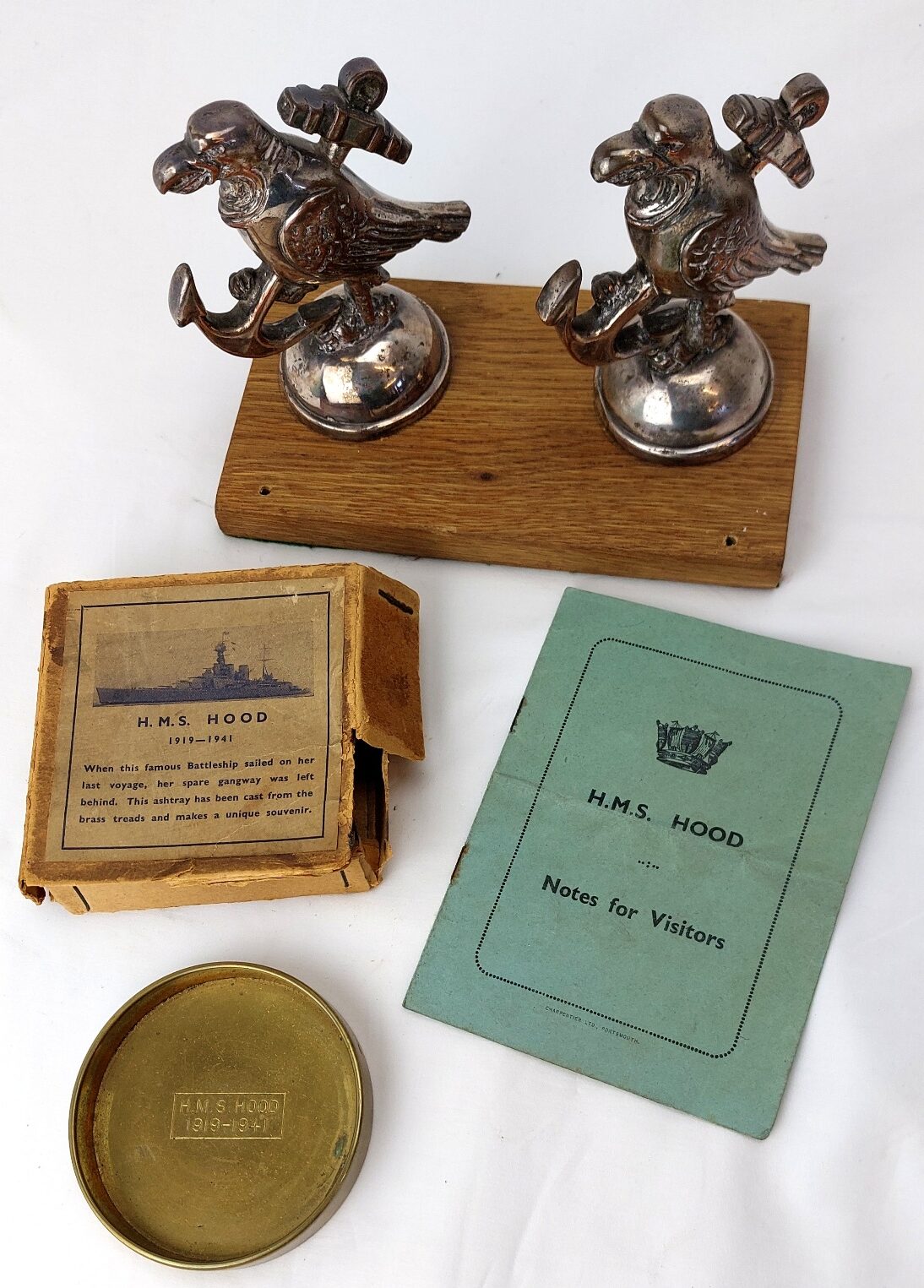 Rare, British Naval Heritage, c. 1920-41, HMS Hood Collection: Pair of Bandmaster Music Stand Finials, Commemorative Brass Ashtray & 1920s Visitor's Guide (3)