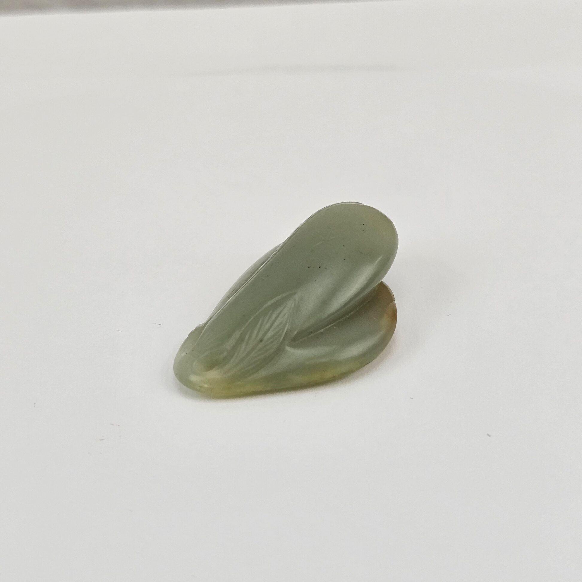Chinese Carved Celadon and Russet Nephrite Jade Pendant Double Peach Group, Qing Dynasty or Earlier - Image 2