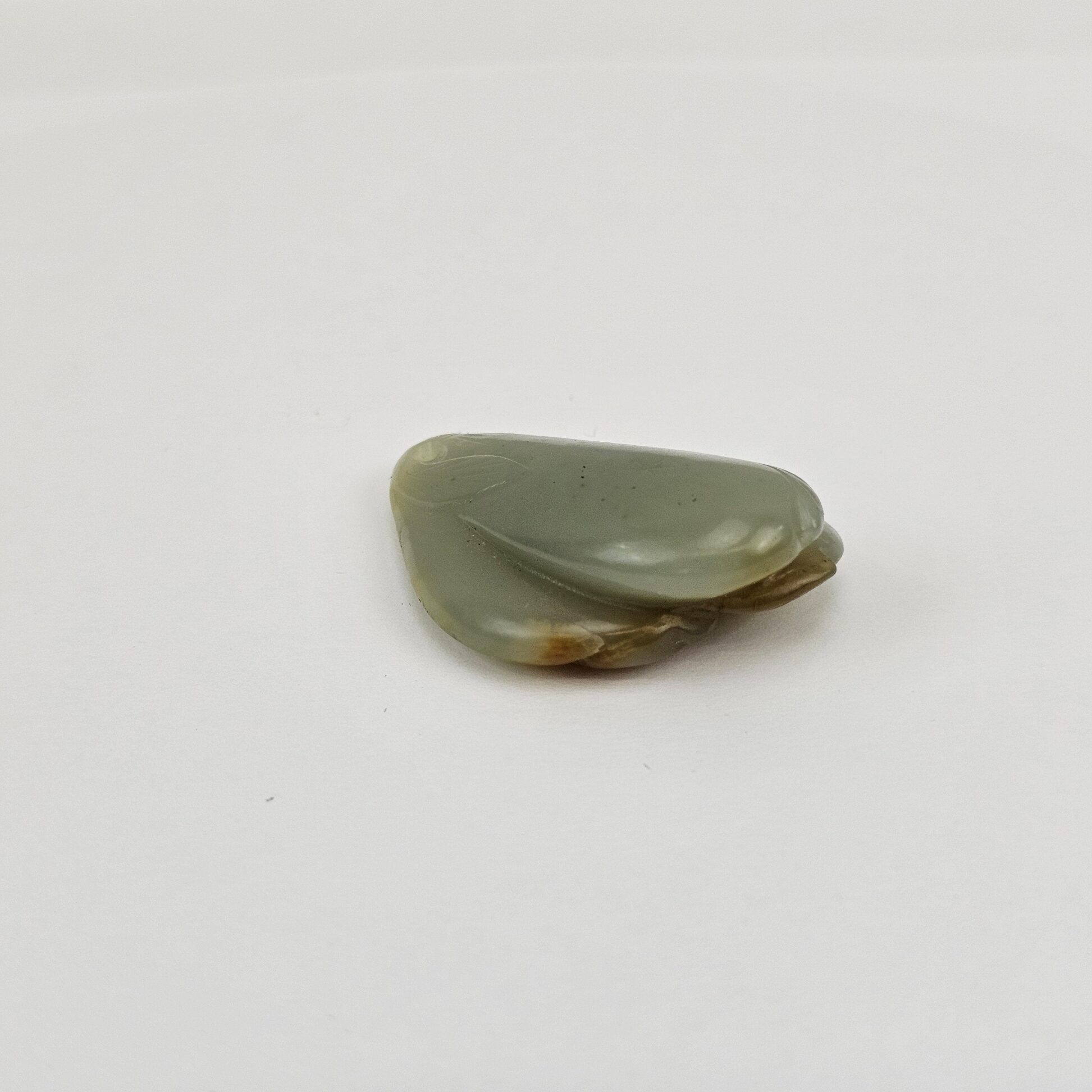 Chinese Carved Celadon and Russet Nephrite Jade Pendant Double Peach Group, Qing Dynasty or Earlier - Image 3