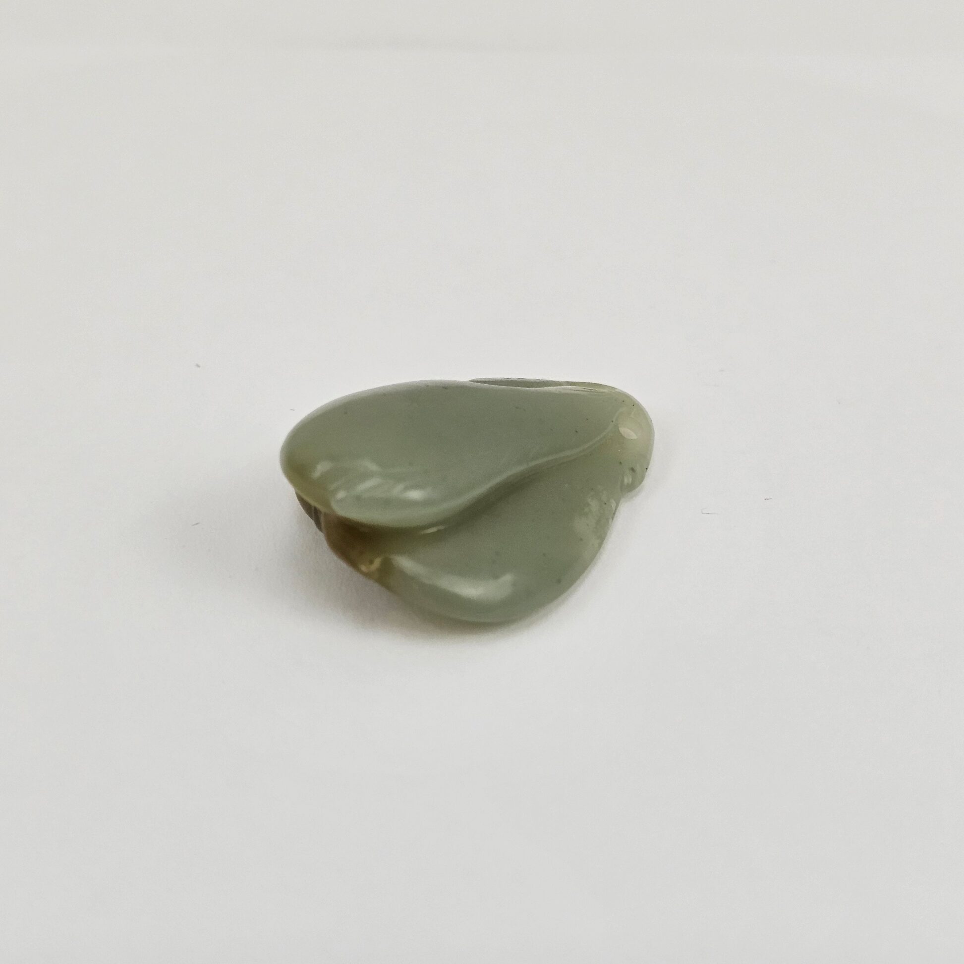 Chinese Carved Celadon and Russet Nephrite Jade Pendant Double Peach Group, Qing Dynasty or Earlier - Image 4