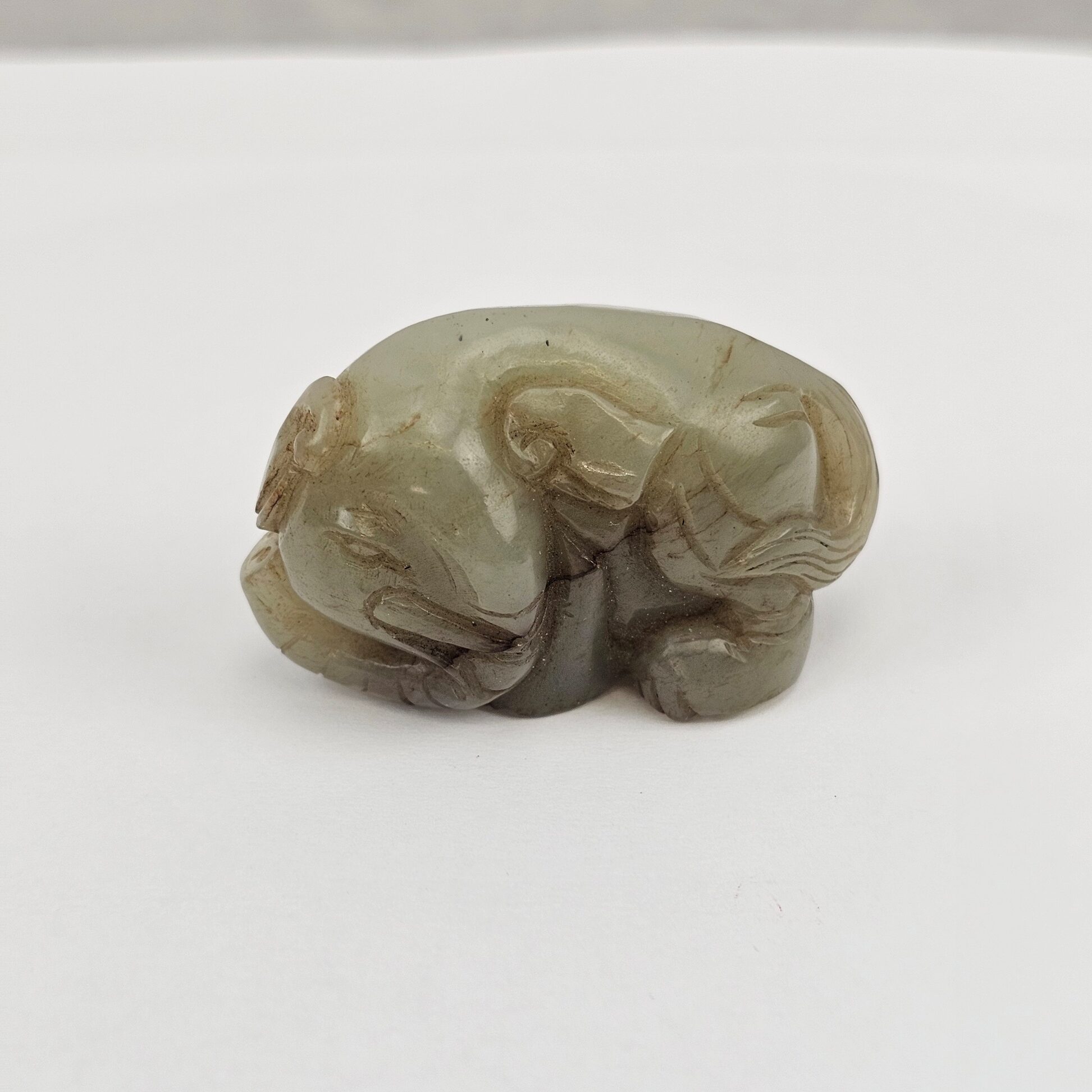 Chinese Nephrite Jade Carving of a Recumbent Elephant in Archaistic Wei Style, Qing Dynasty, 18th to 19th Century