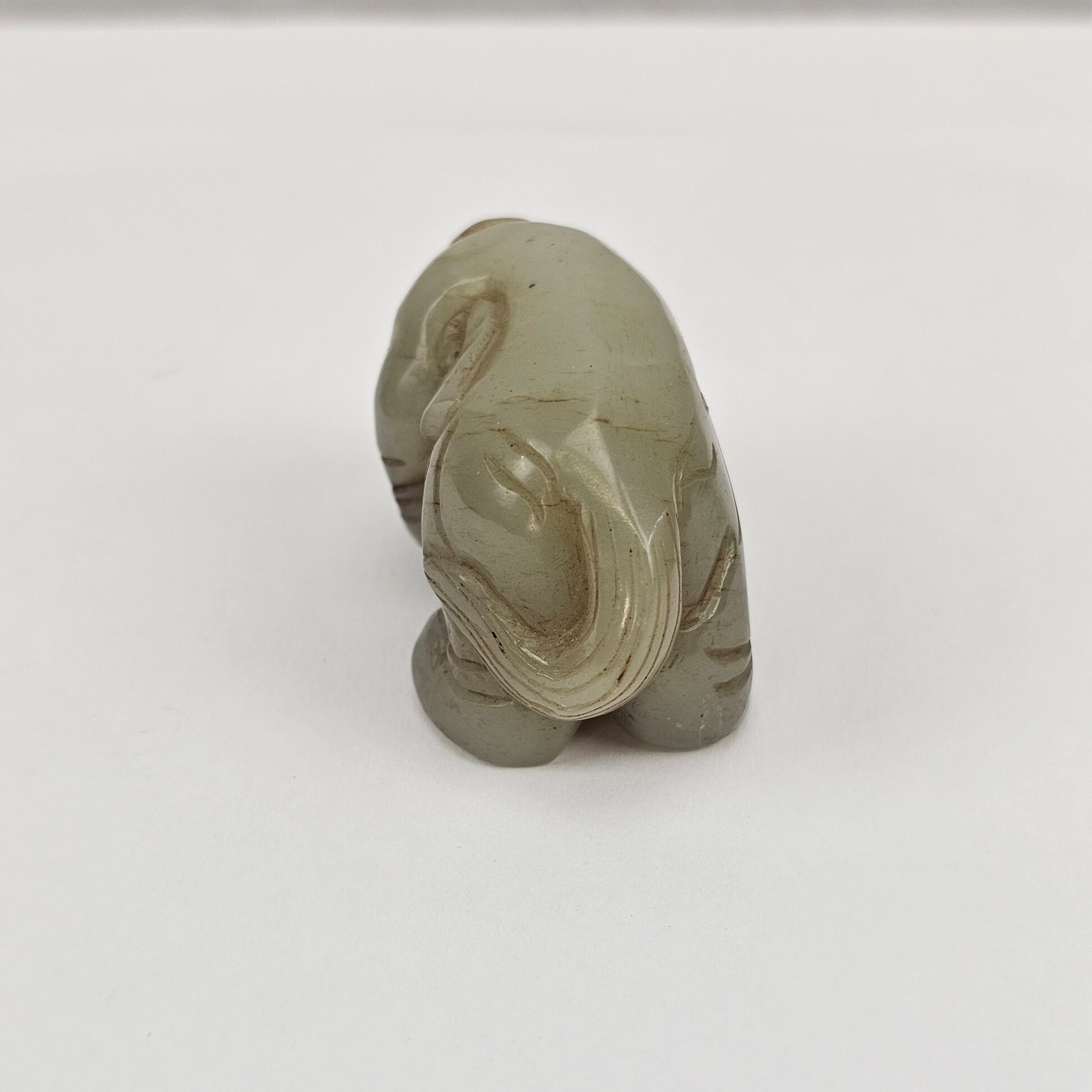 Chinese Nephrite Jade Carving of a Recumbent Elephant in Archaistic Wei Style, Qing Dynasty, 18th to 19th Century - Image 3
