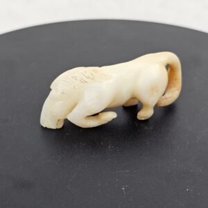 Chinese White and Russet Nephrite Jade Carving of a Kneeling Horse, Possibly Ming Dynasty