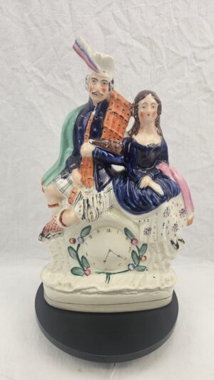 Victorian Staffordshire Flatback Pottery Clock Group - Scottish Highland Couple with Bagpipes, circa 1860-1880