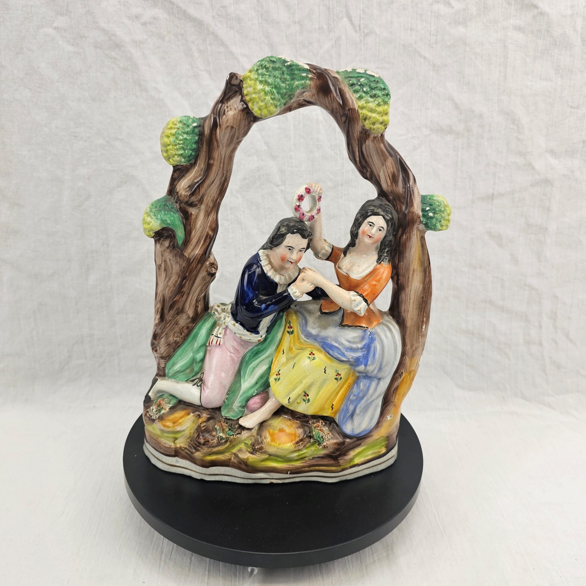 Victorian Staffordshire Figural Group of a Courting Couple in an Arbour, c.1850–1870