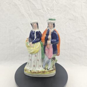 Victorian Staffordshire Figural Group of a Flautist and Flower Seller, c.1850–1870